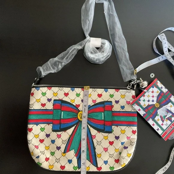 Brighton Love & Joy Pouch Crossbody Bag NWT Tom Clancy Hearts Tassel Holiday - Picture 6 of 7